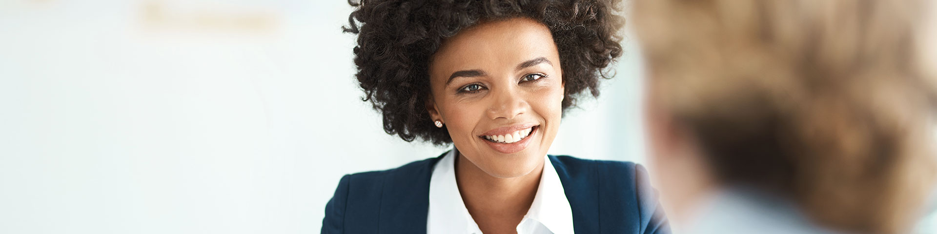 Woman smiling and talking